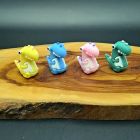[R2283] Lot de 4 capuchons de crayon dinosaures colorés en caoutchouc souple