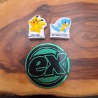 [R2364] 2 fèves pokémons + jeton Ex
