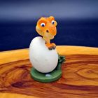 [R2731] Figurine age de glace dinosaure qui sort de l’œuf